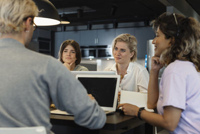 Business people having meeting in conference room