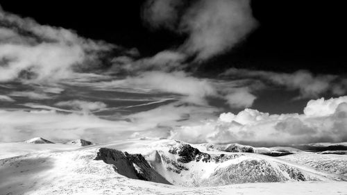 Scenic view of snowcapped mountain against sky