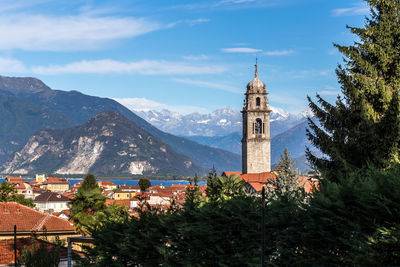 High angle view of buildings and trees against sky