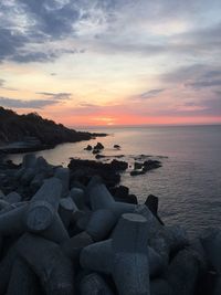 Scenic view of sea against sky during sunset