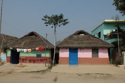 Built structure on beach against clear sky