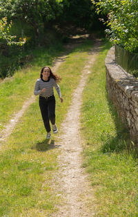 Girl runs in the field