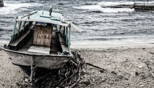 Nautical vessel on sea shore