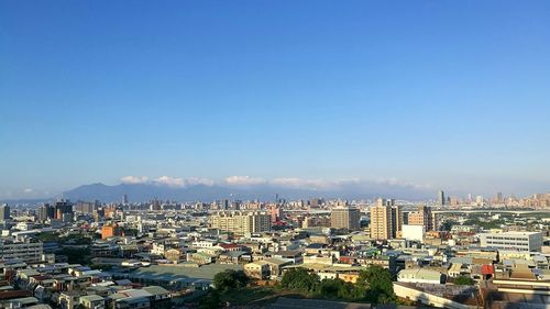 View of cityscape against clear sky