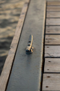 High angle view of wood on pier