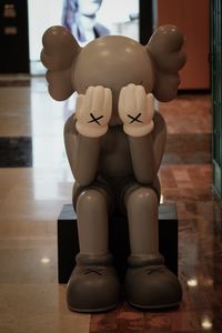 Close-up of figurine on table