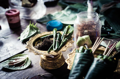 Close-up of paans with ingredients on table