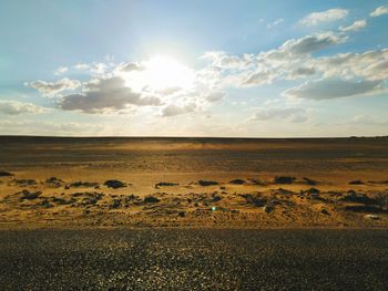 Scenic view of desert against sky