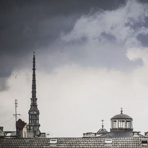 View of building against cloudy sky