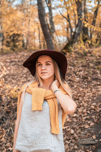 Portrait of a young woman wearing hat