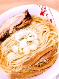 High angle view of noodles in plate on table