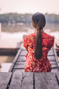 Young woman in traditional clothing outdoors