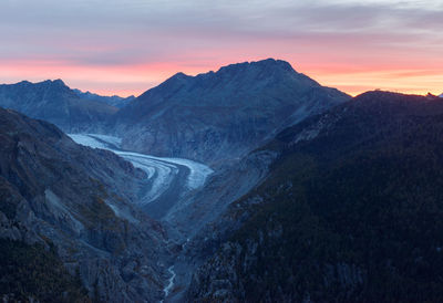 Scenic view of mountains against sky during sunset