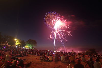 Firework display at night