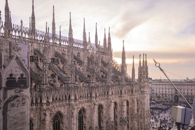 The cathedral of milan duomo seen from above by sunset