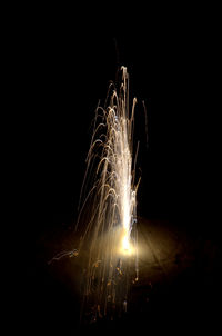 Firework display at night