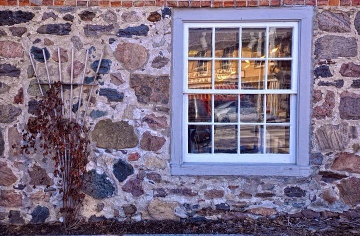 window, architecture, building exterior, built structure, glass - material, brick wall, house, transparent, wall - building feature, old, abandoned, day, weathered, no people, damaged, reflection, stone wall, outdoors, building, window frame