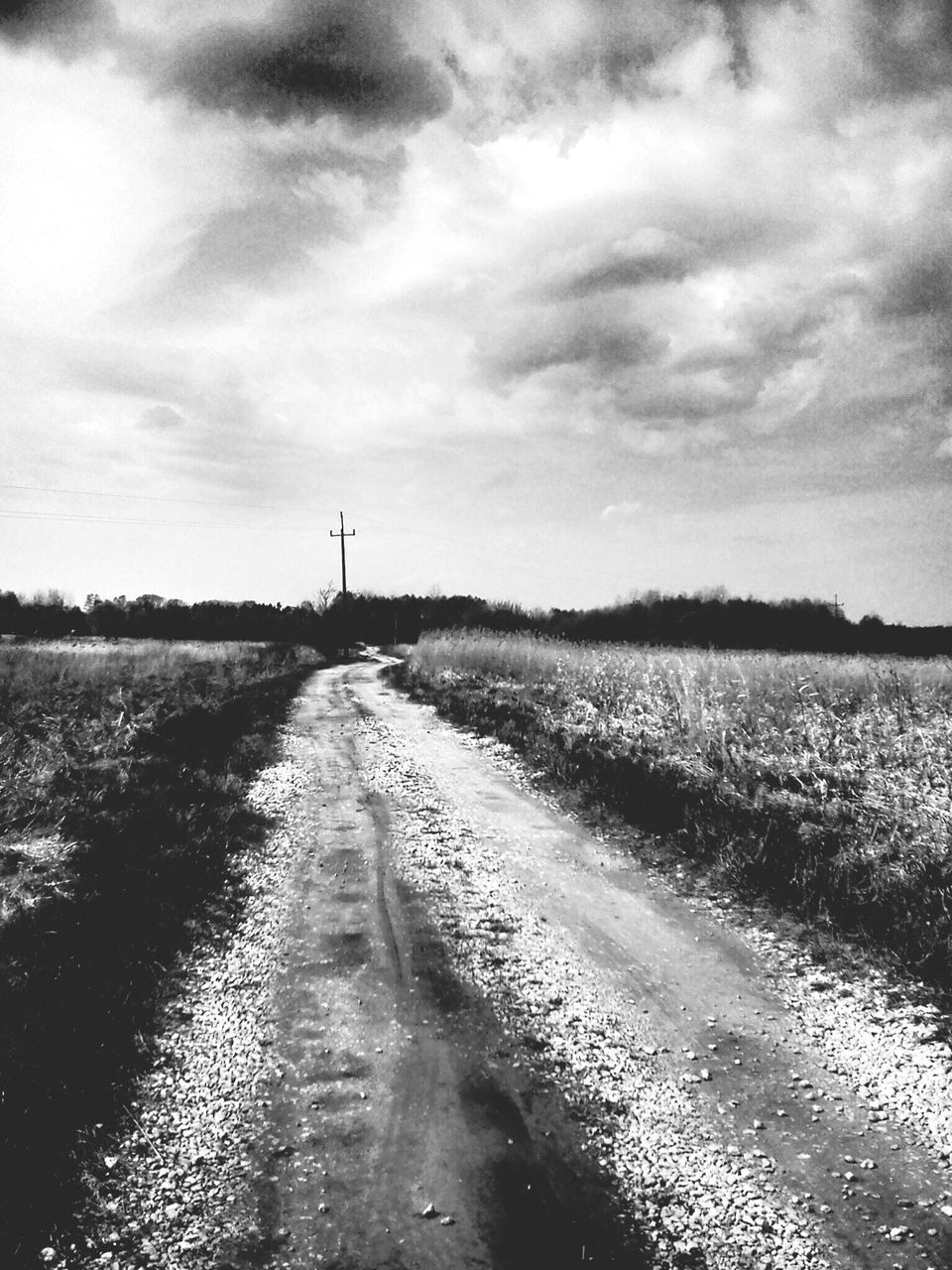 the way forward, sky, diminishing perspective, water, cloud - sky, vanishing point, tranquility, tranquil scene, cloudy, nature, cloud, scenics, beauty in nature, landscape, dirt road, road, weather, overcast, non-urban scene, day