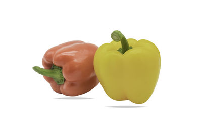 Close-up of yellow bell pepper against white background