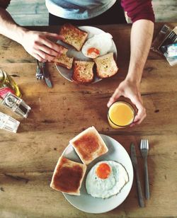 Close-up of hand holding coffee