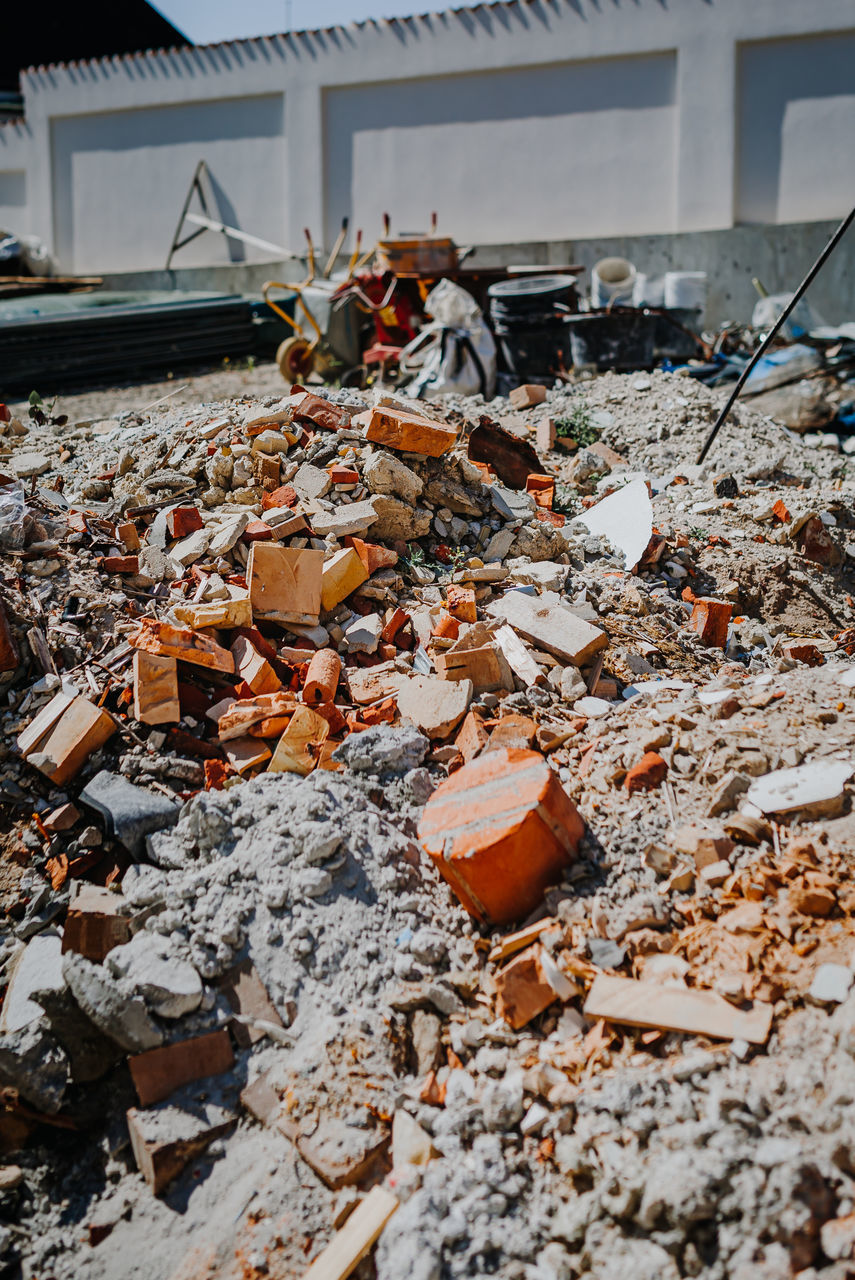 HIGH ANGLE VIEW OF DAMAGED CONSTRUCTION SITE IN CITY