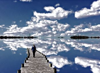 Scenic view of calm lake against clear sky