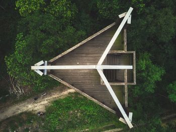 Built structure on field in forest