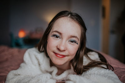 Portrait of smiling woman at home