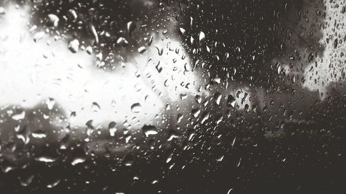 Full frame shot of wet window in rainy season