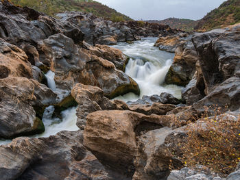 River flowing through rocks