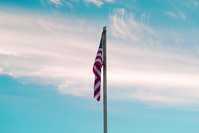 Low angle view of flag against sky