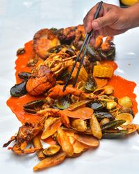 Close-up of hand holding food