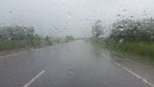 View of rain drops on road