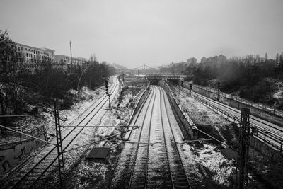 High angle view of railroad tracks against sky, snow, berlin, s-bahn