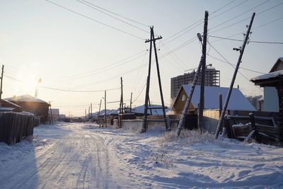 Scenic view of snow covered landscape against clear sky