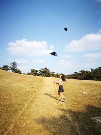 Girl on grassy field