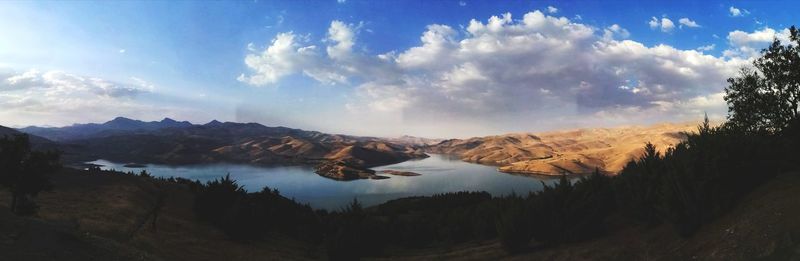 Panoramic view of landscape and mountains against sky