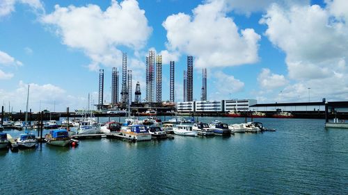 Boats moored at harbor