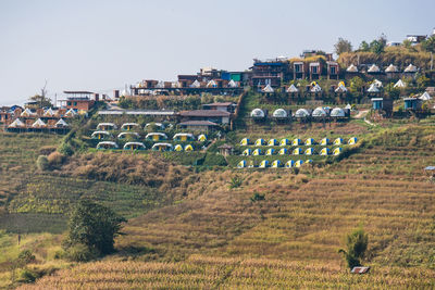 High angle view of buildings against clear sky