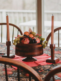 Close-up of fruits in basket on table