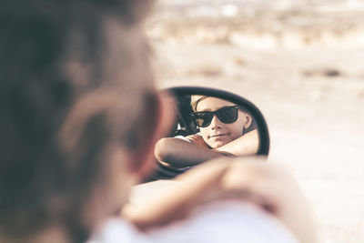 Portrait of woman wearing sunglasses