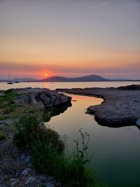 Scenic view of sea against sky during sunset