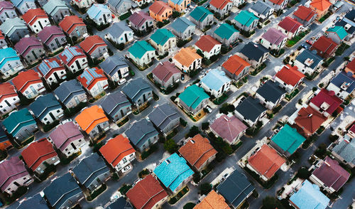 High angle view of multi colored houses in city