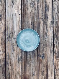 Directly above shot of plate on wooden table