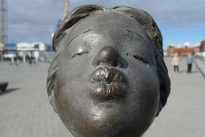 Close-up of statue against sky