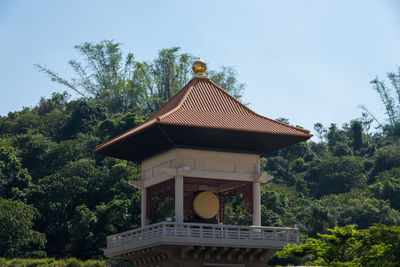 Built structure against trees