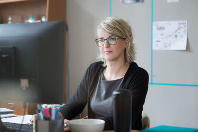 Close-up of woman standing in pond