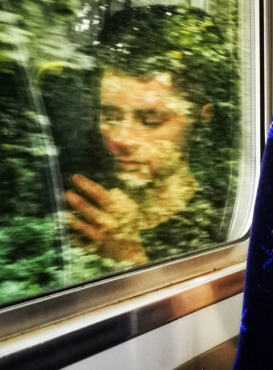 BLURRED MOTION OF TRAIN WINDOW