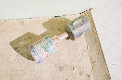 High angle view of coins on wall