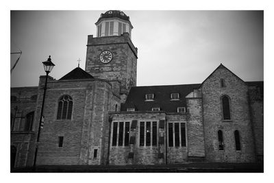 Clock tower against sky